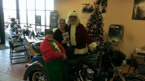 Santa and his helpers check out a new way to deliver copies of Ride Minnesota.